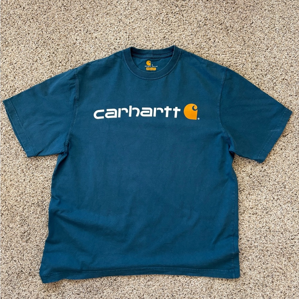 Carhartt Originall Fit T-Shirt. Size large. Color is blue-green. Fair condition.